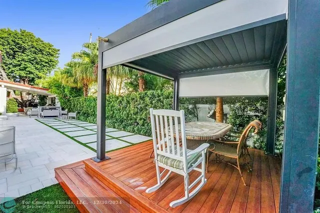 a dining room with table and chairs