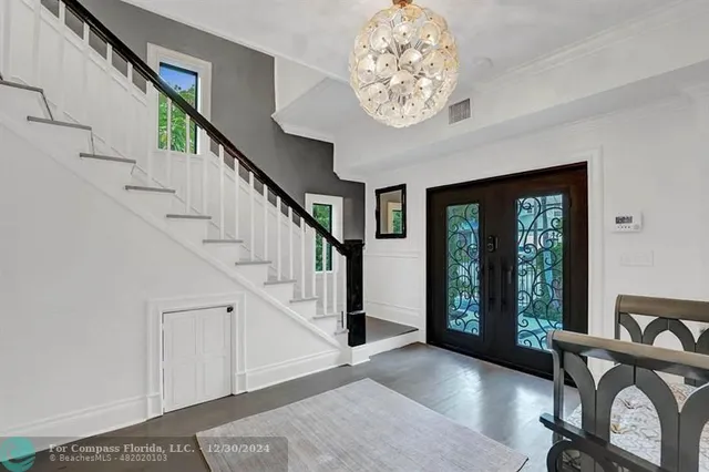 a bedroom with a bed furniture and a window