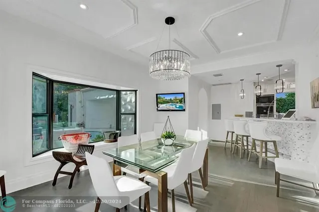 a bathroom with a sink a toilet and a shower