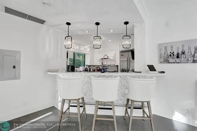 a bathroom with a double vanity sink mirror and double