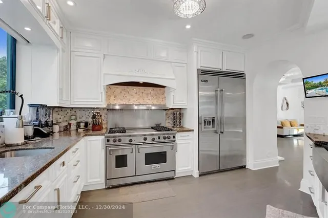 a bathroom with a bathtub and a sink