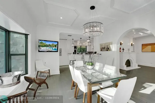 a bathroom with a sink a mirror and shower