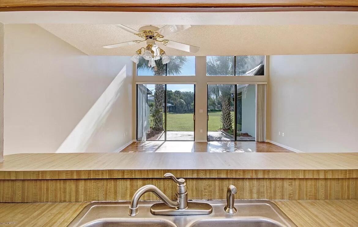 2 Country Club Road, Unit 26 Cocoa Beach, FL 32931 - Photo 9 of 10 a close view of a sink and mirror