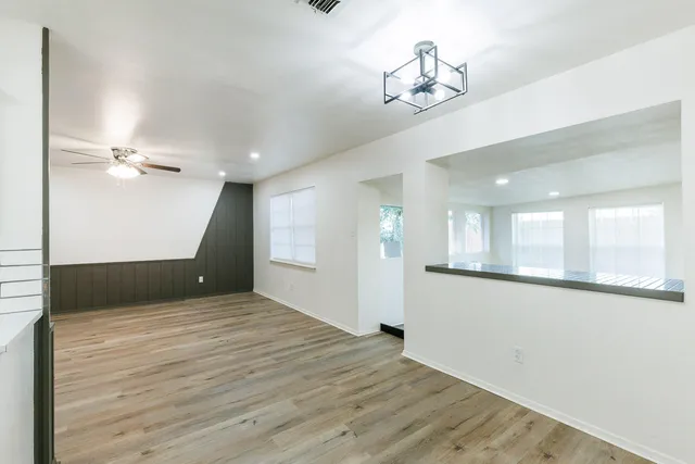 a view of an empty room and window