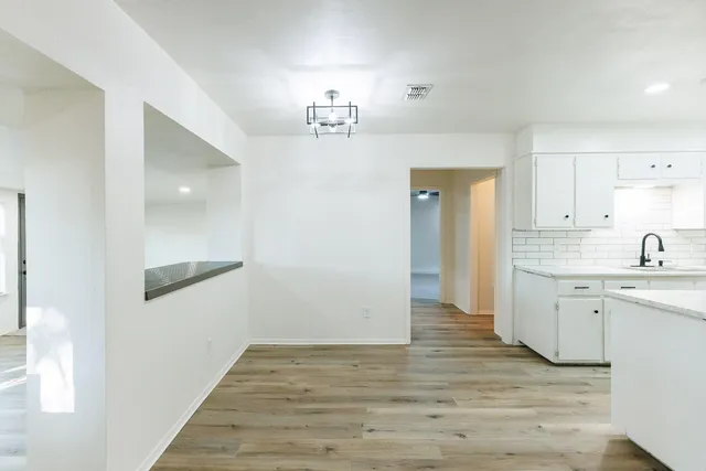 a view of kitchen and sink