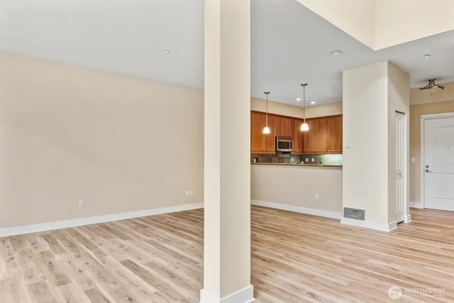 a view of a kitchen from the hallway