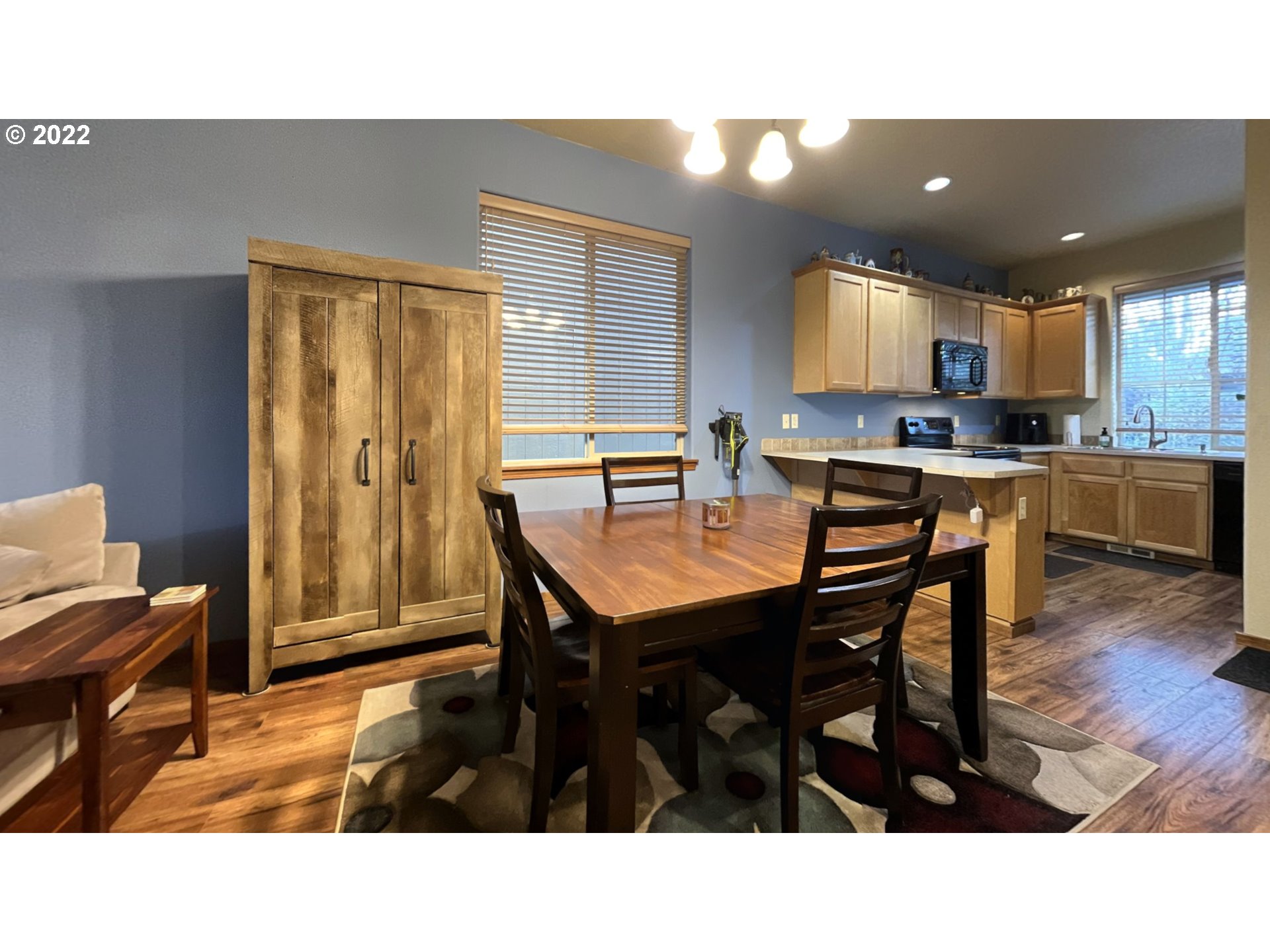 40460 Dubarko Road Sandy, OR 97055 - Photo 28 of 32 a kitchen with a table and chairs in it