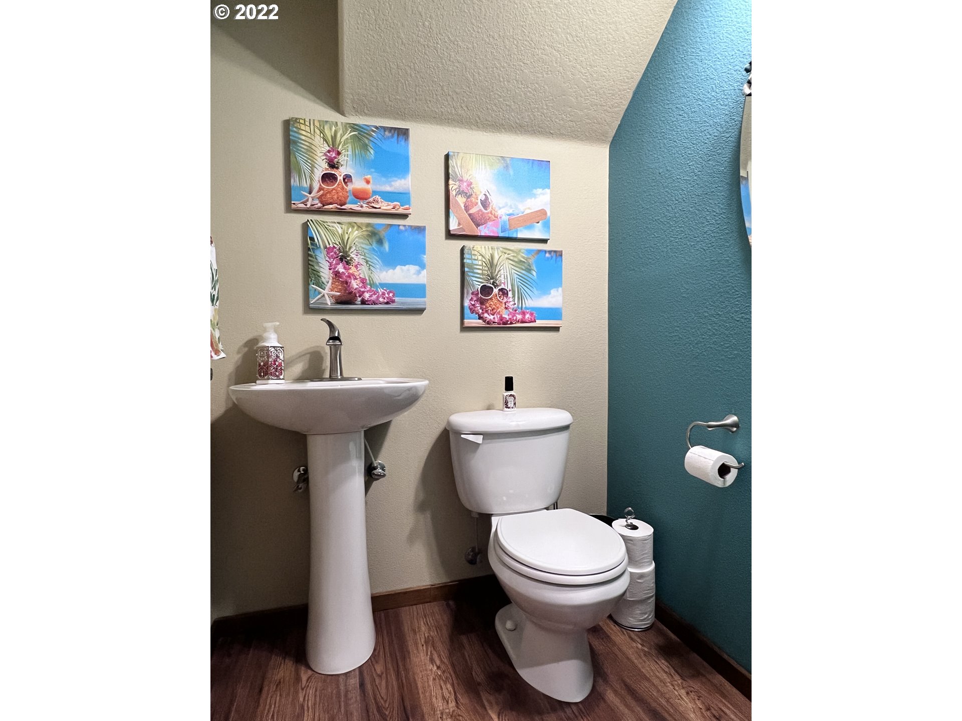40460 Dubarko Road Sandy, OR 97055 - Photo 3 of 32 a bathroom with a toilet a sink and a mirror
