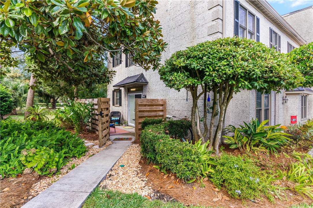 1035 Beach View Drive, Unit 201 St. Simons Island, GA 31522 - Photo 3 of 18 side patio to wash feet from beach