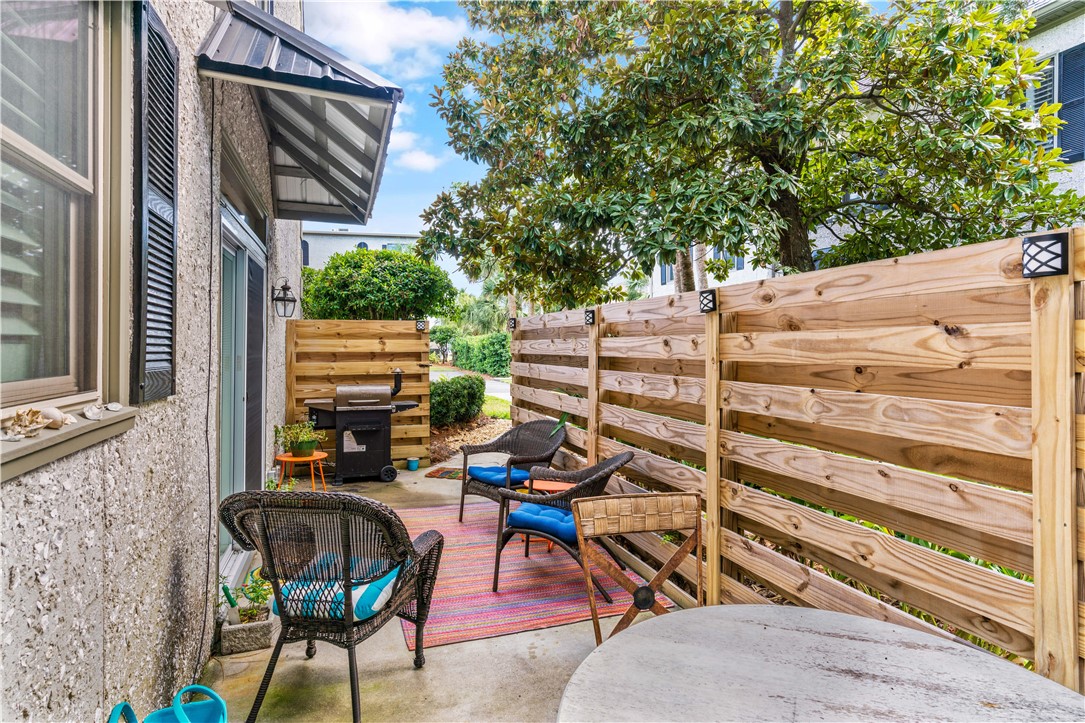 1035 Beach View Drive, Unit 201 St. Simons Island, GA 31522 - Photo 4 of 18 private enclosed patio with grill