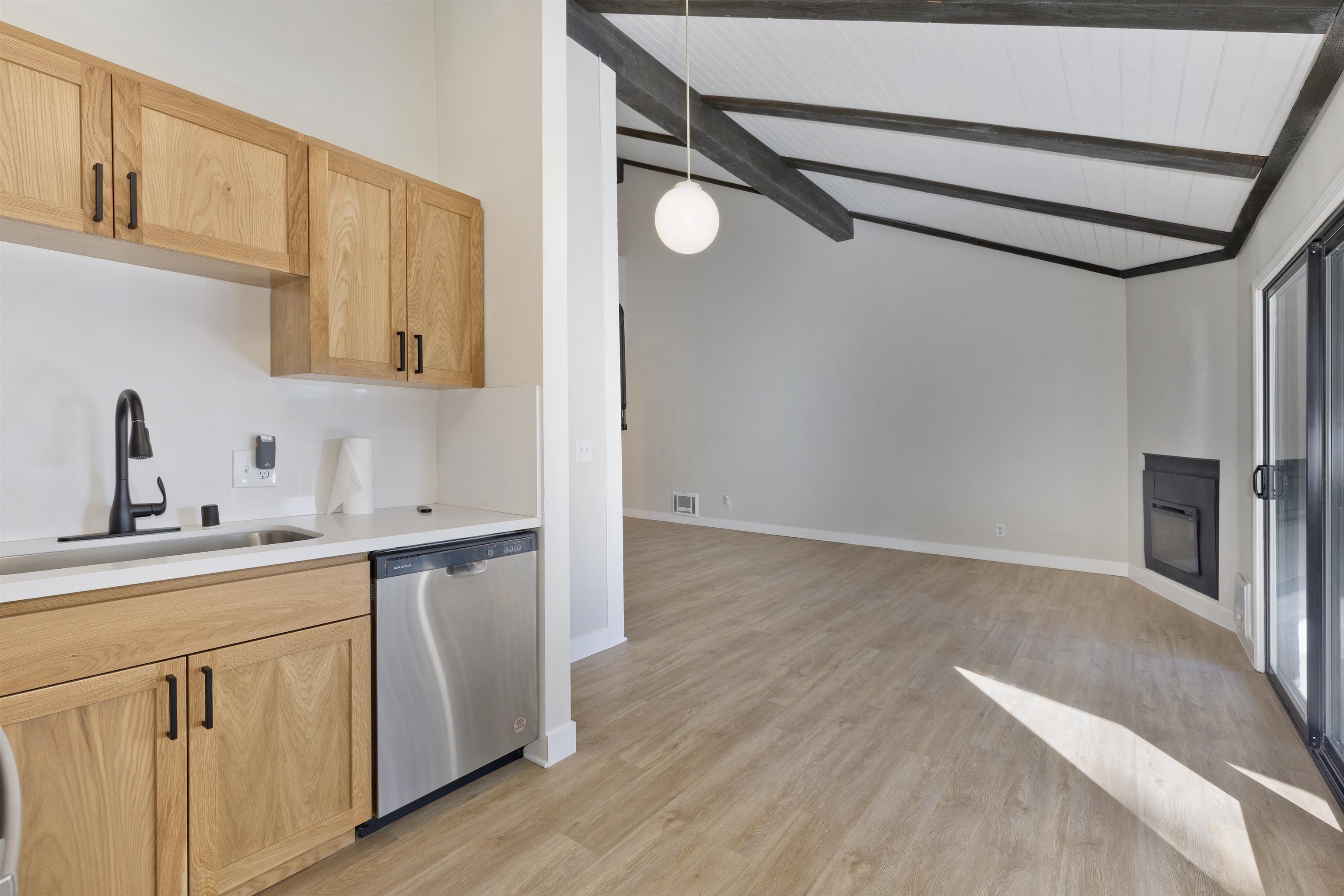 362 Old Mammoth Road, Unit 58 Mammoth Lakes, CA 93546 - Photo 6 of 26 a kitchen with a sink cabinets and wooden floor