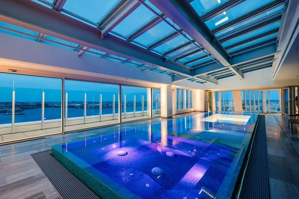 a view of a swimming pool with a patio