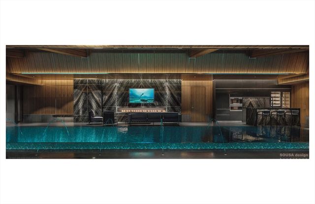 a bathroom with a sink and mirror