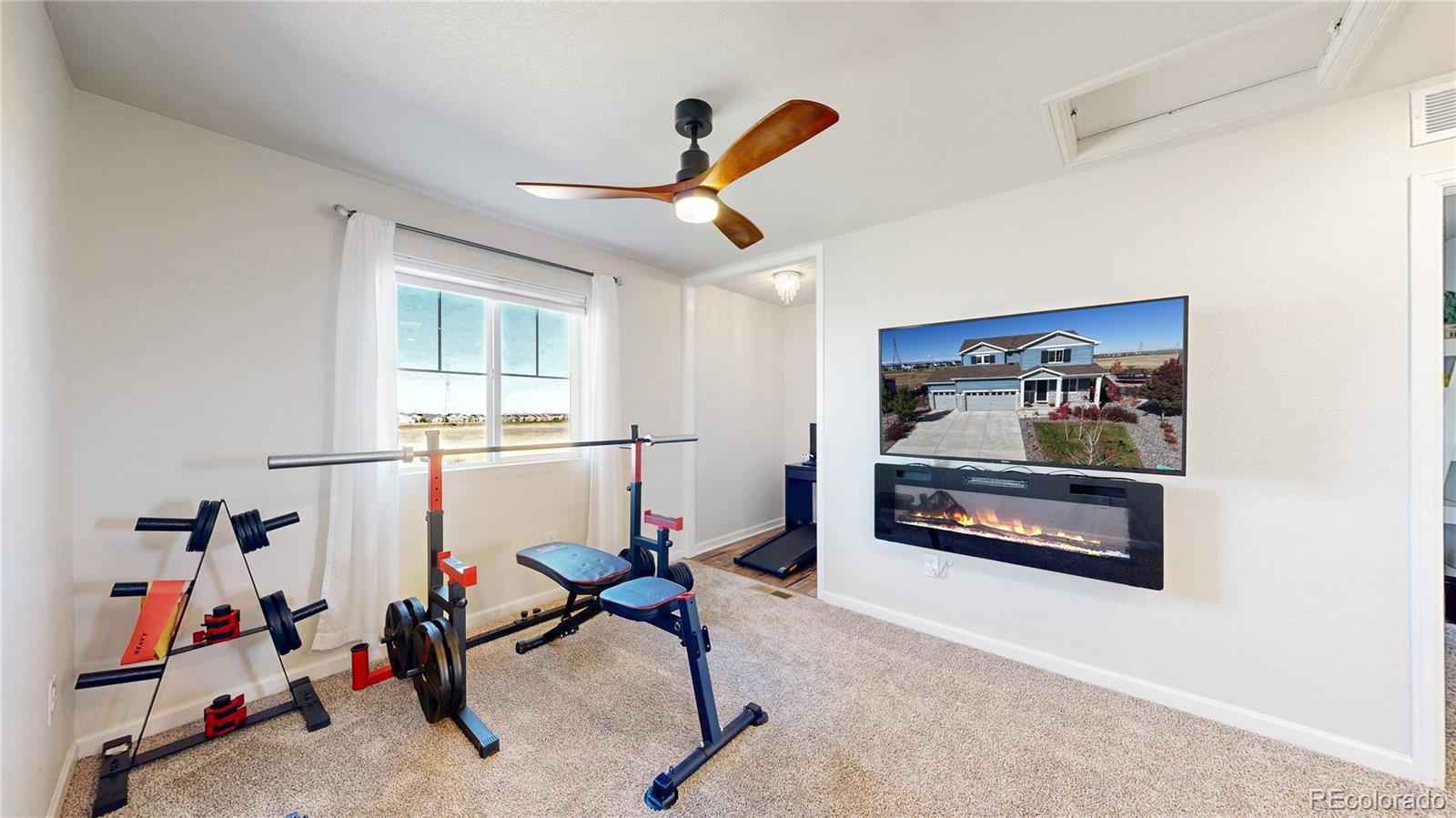 26709 East 1st Place Aurora, CO 80018 - Photo 20 of 50 a room with furniture and air hockey table