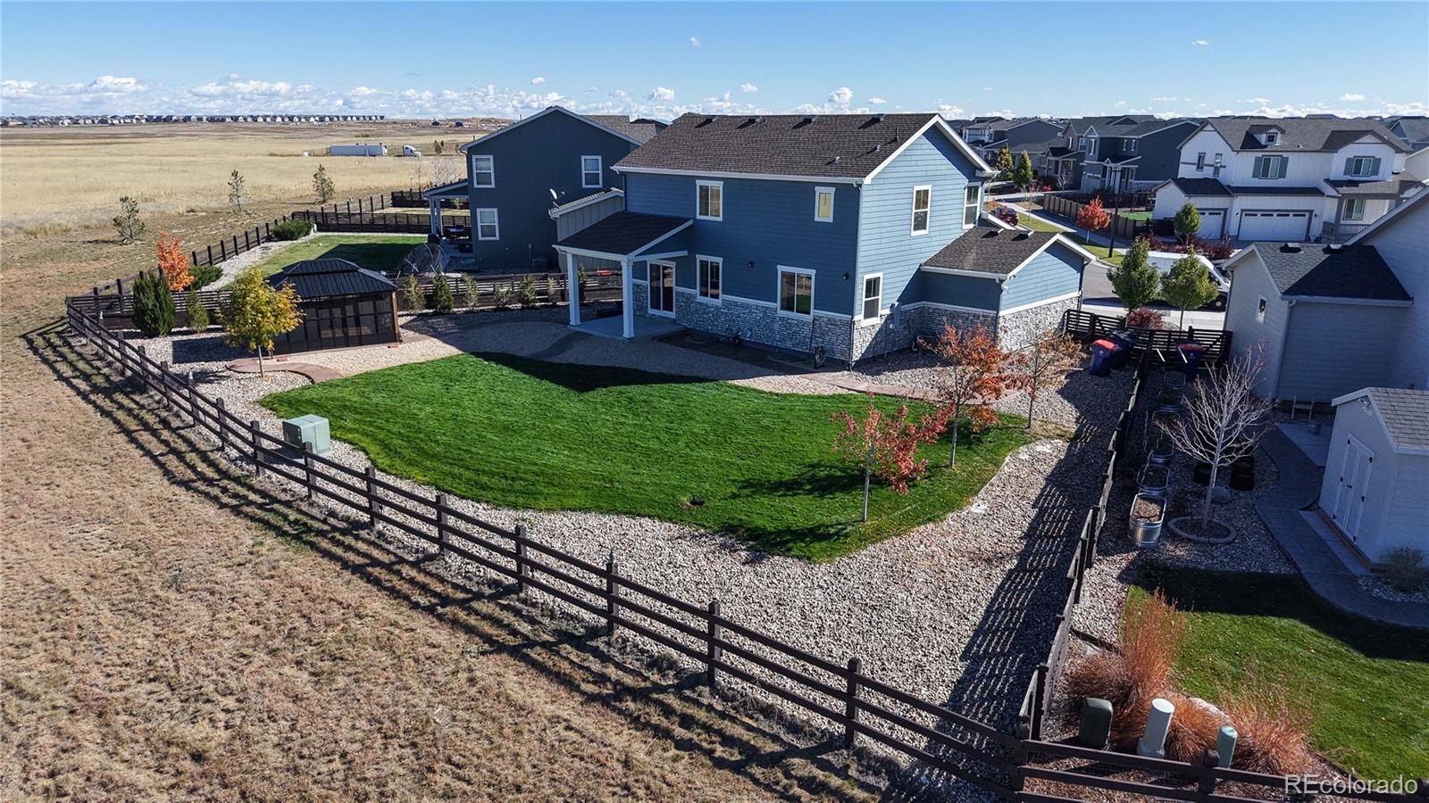 26709 East 1st Place Aurora, CO 80018 - Photo 42 of 50 an aerial view of a house with garden space and street view