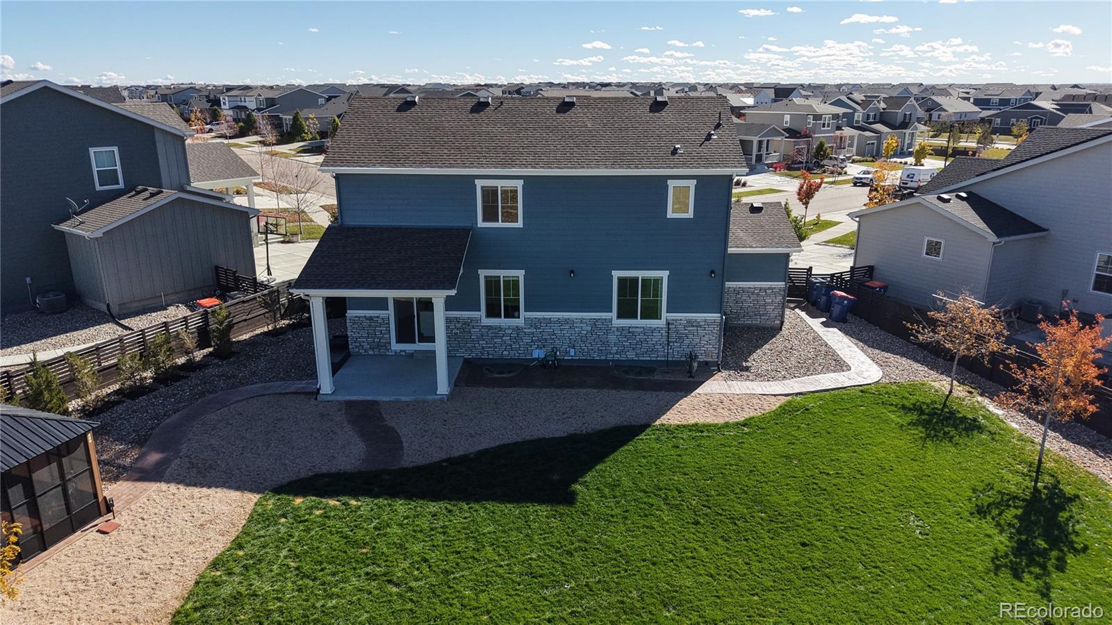 26709 East 1st Place Aurora, CO 80018 - Photo 43 of 50 an aerial view of a house with a yard