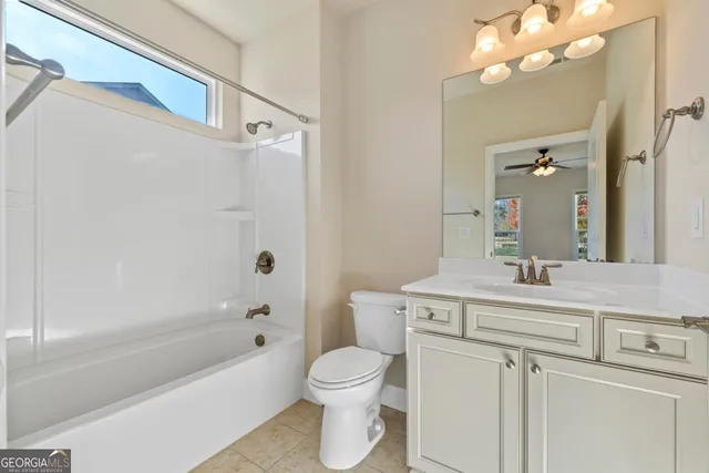 a view of room with chair and closet