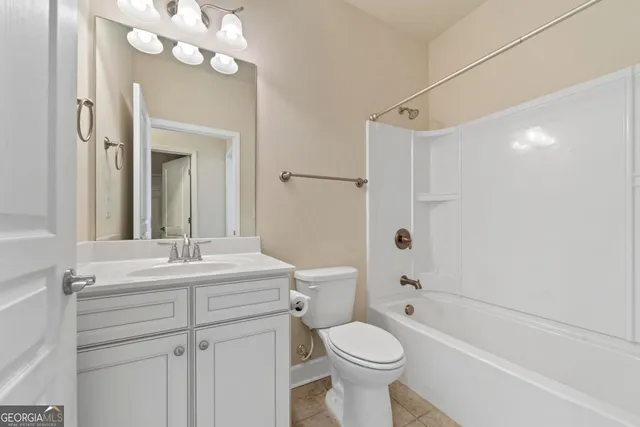 a view of swimming pool with outdoor seating and city view