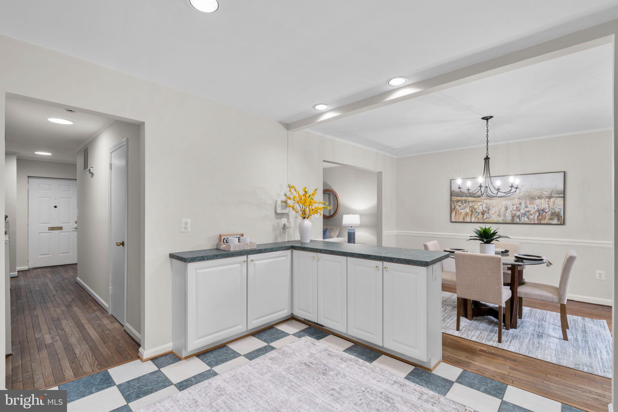2126 Golf Course Drive Reston, VA 20191 - Photo 47 of 48 a kitchen with granite countertop a sink and stove