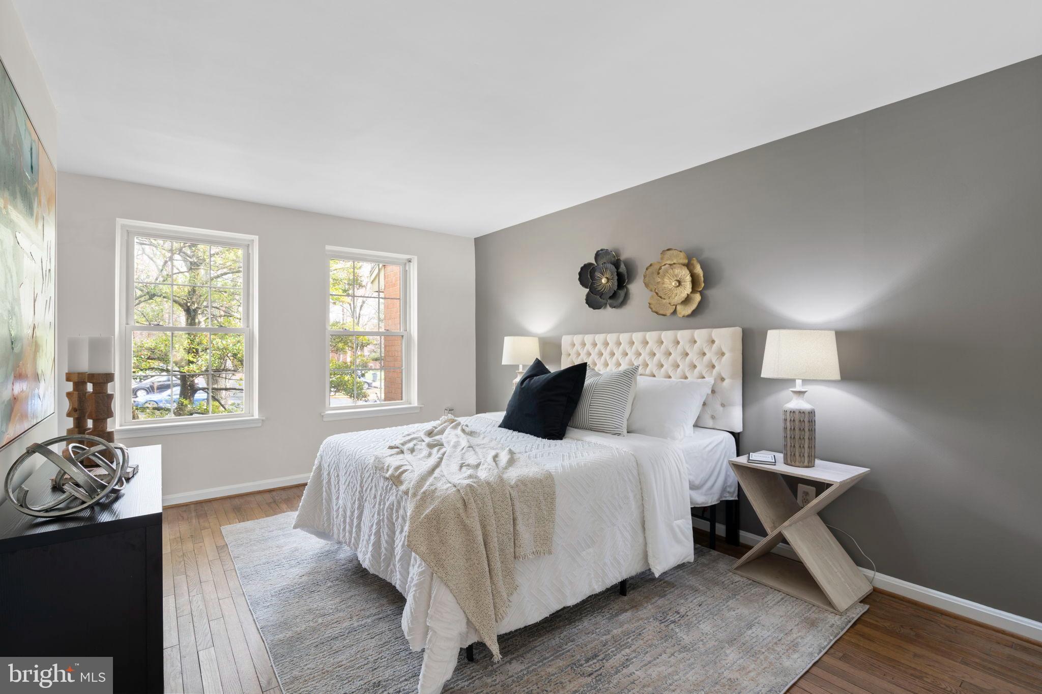 2126 Golf Course Drive Reston, VA 20191 - Photo 19 of 48 a bedroom with a bed wooden floor and window