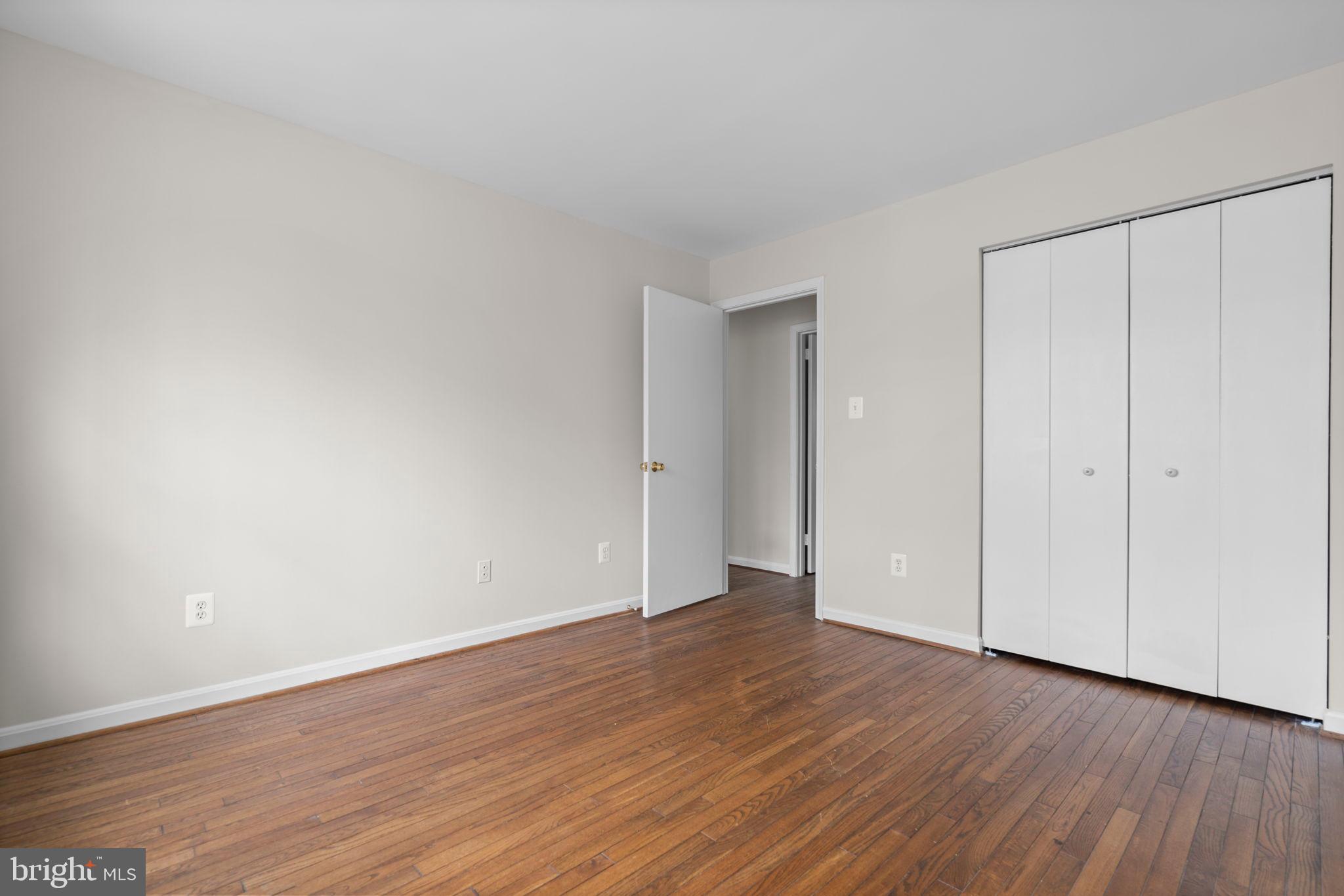 2126 Golf Course Drive Reston, VA 20191 - Photo 26 of 48 a view of an empty room with wooden floor