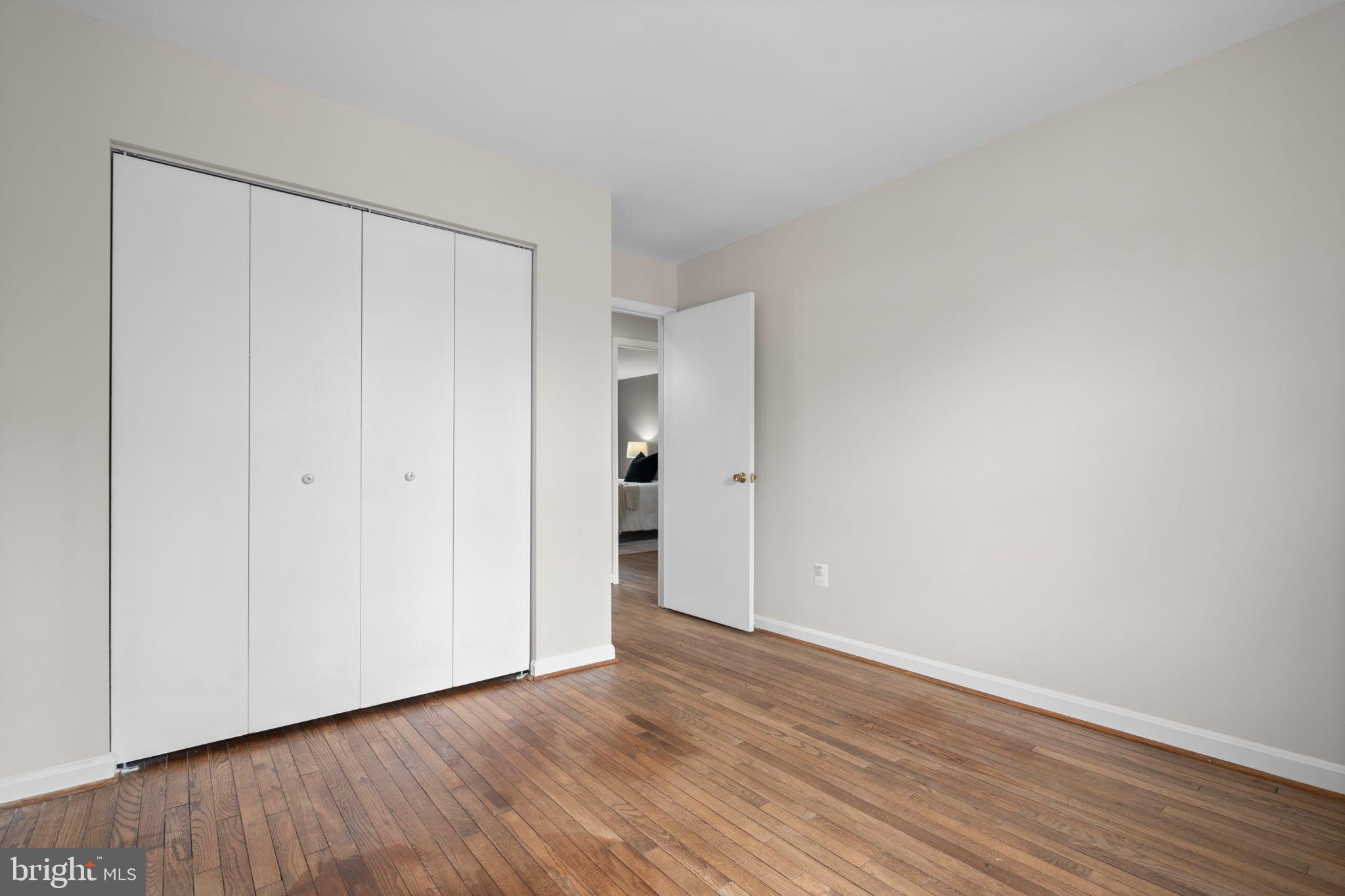 2126 Golf Course Drive Reston, VA 20191 - Photo 30 of 48 a view of an empty room with wooden floor