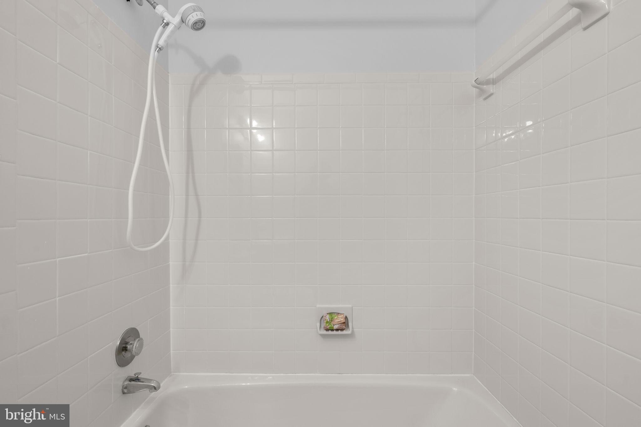 2126 Golf Course Drive Reston, VA 20191 - Photo 32 of 48 a bathroom with a bathtub