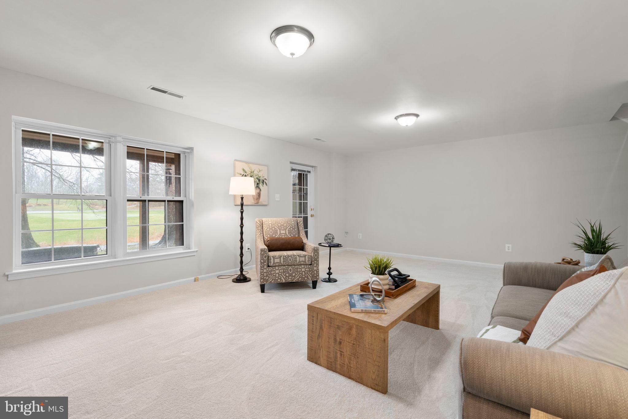 2126 Golf Course Drive Reston, VA 20191 - Photo 37 of 48 a living room with furniture and a window