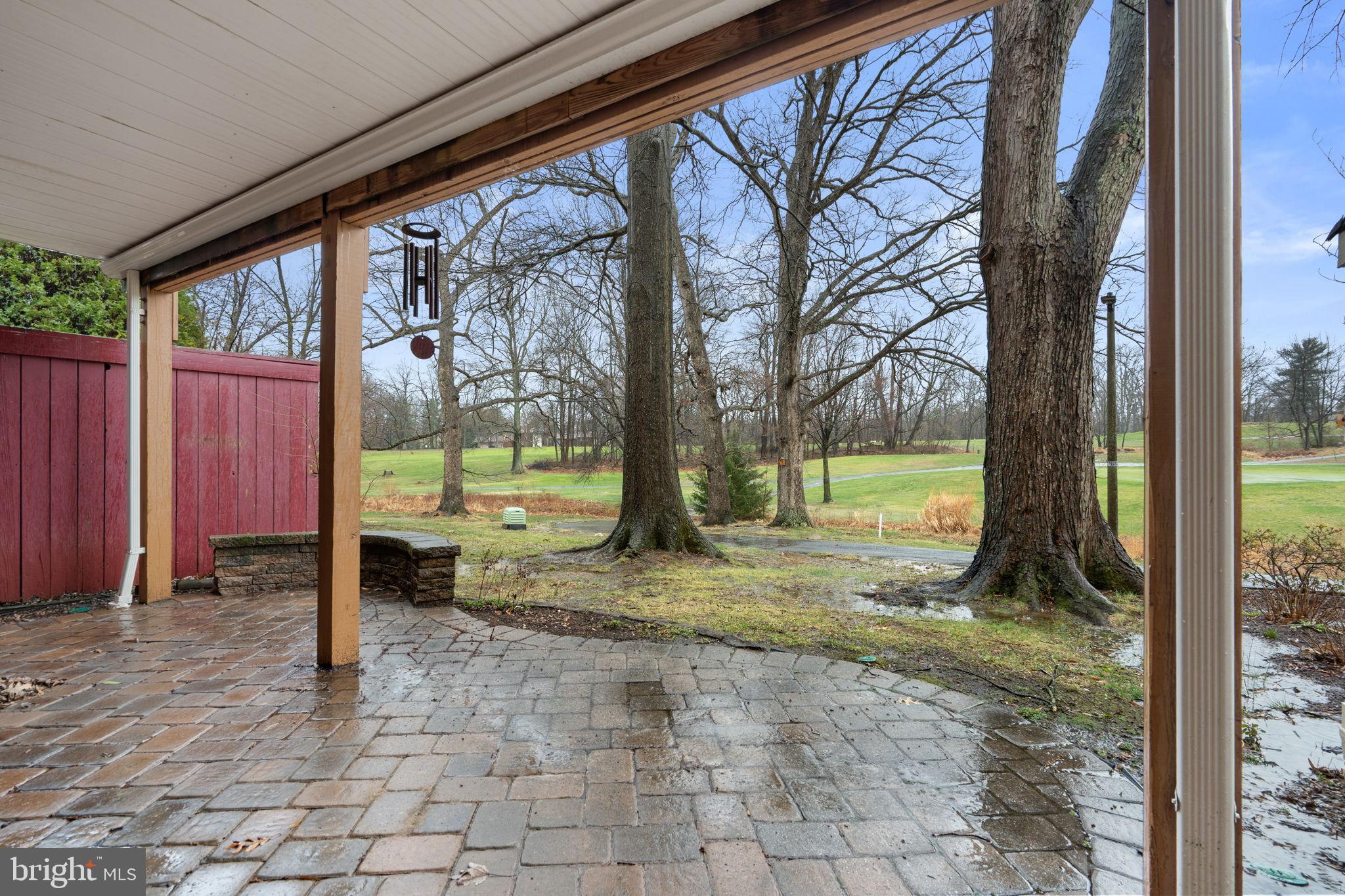 2126 Golf Course Drive Reston, VA 20191 - Photo 41 of 48 a view of a porch with a fireplace in the patio