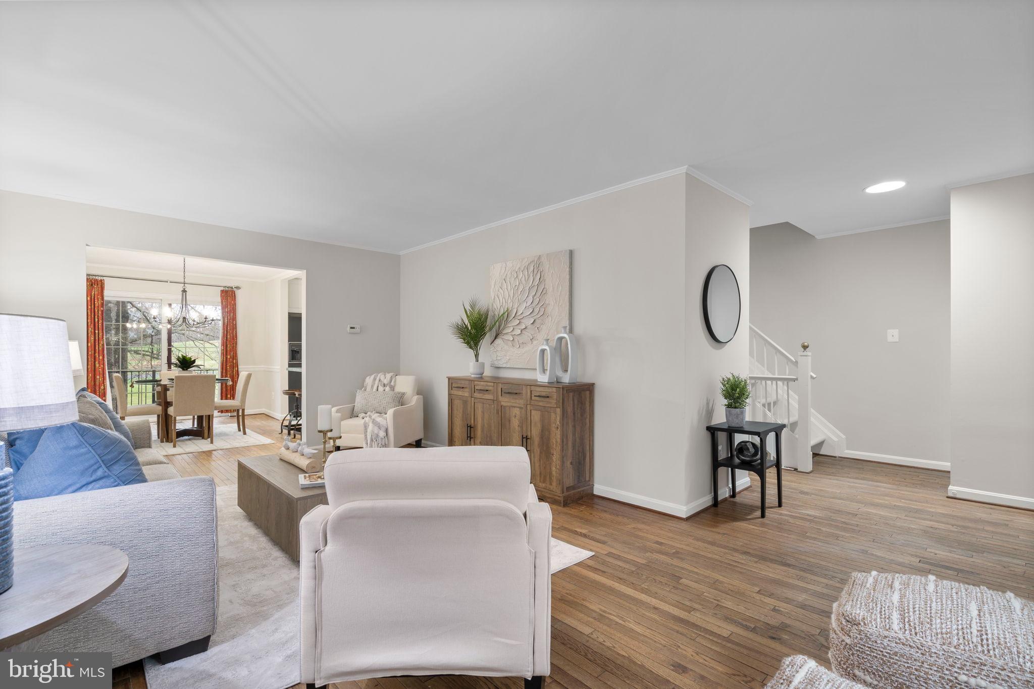 2126 Golf Course Drive Reston, VA 20191 - Photo 7 of 48 a living room with furniture and a wooden floor
