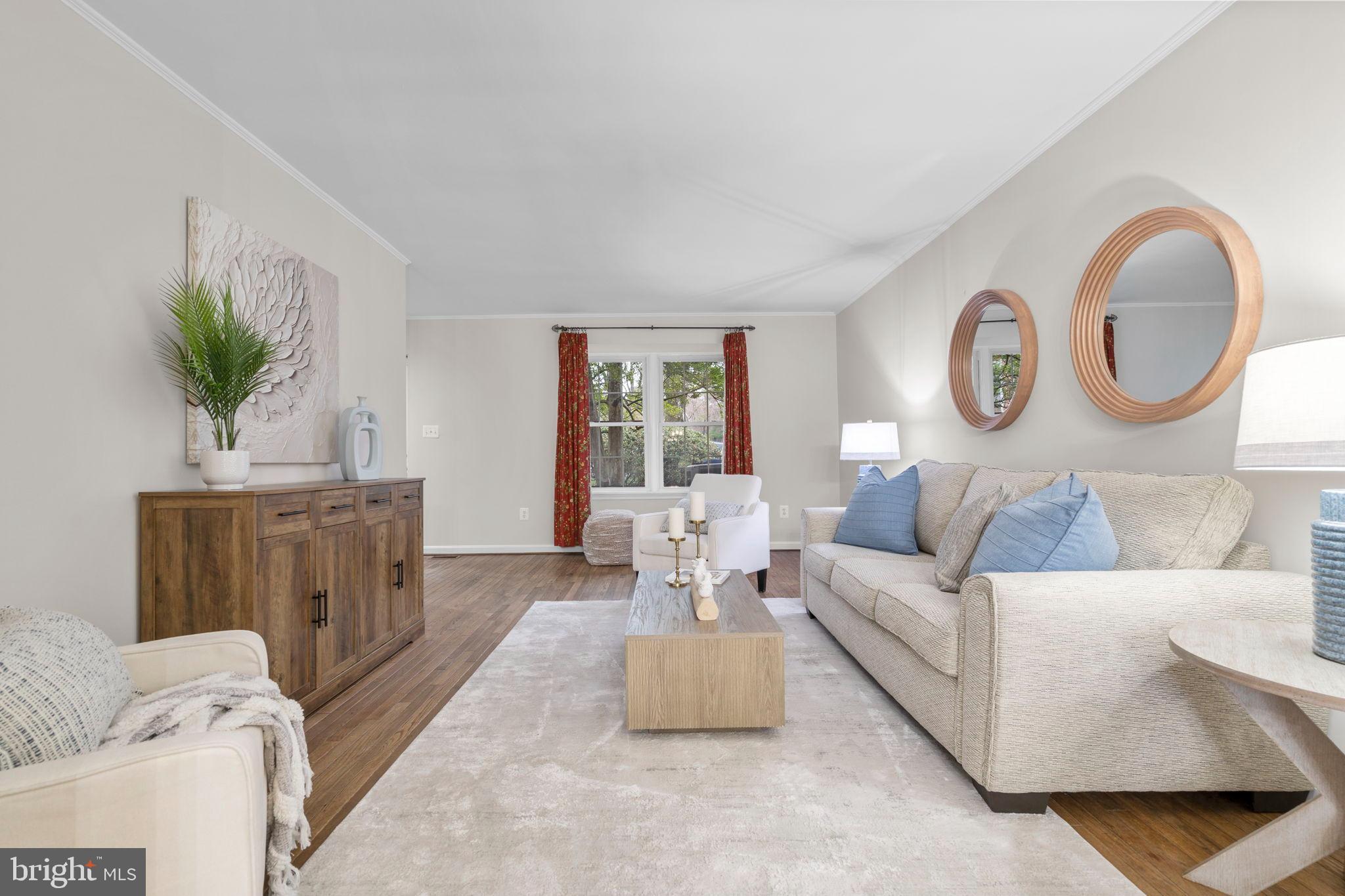 2126 Golf Course Drive Reston, VA 20191 - Photo 8 of 48 a living room with furniture and a large window