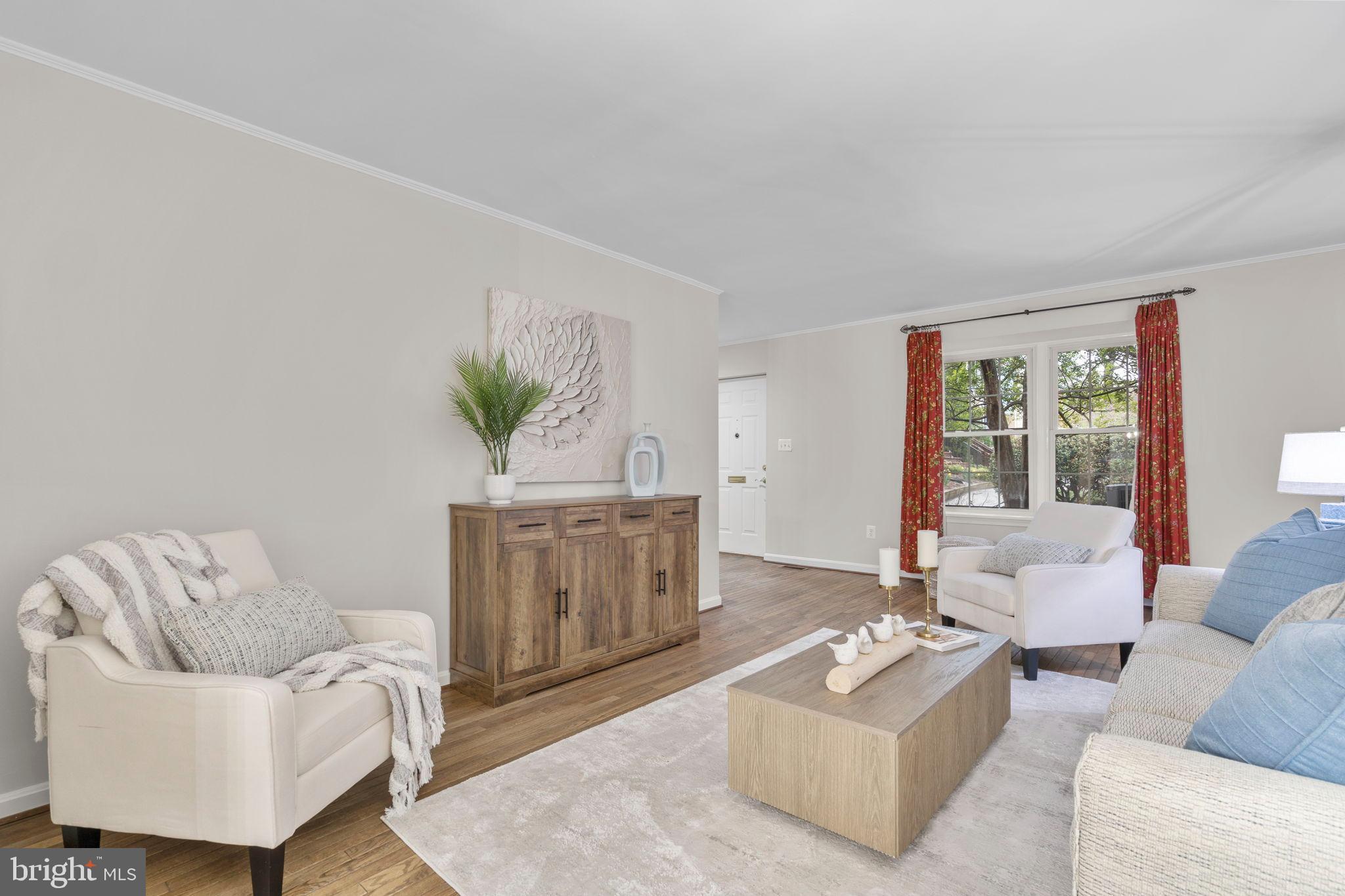 2126 Golf Course Drive Reston, VA 20191 - Photo 9 of 48 a living room with furniture and wooden floor
