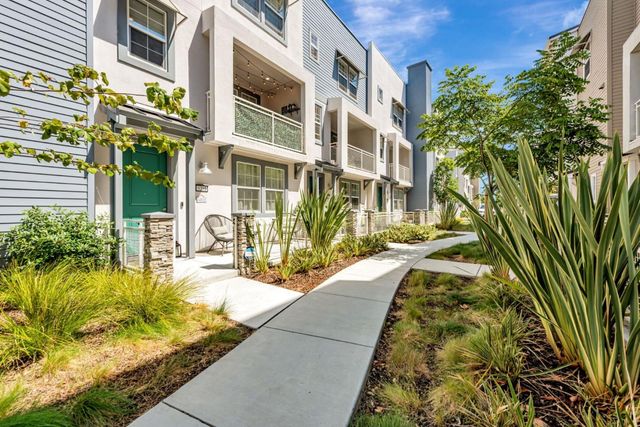 a view of a multi story residential apartment building