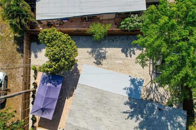 swimming pool view with a seating space