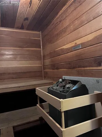 a kitchen with a stove and a cabinet