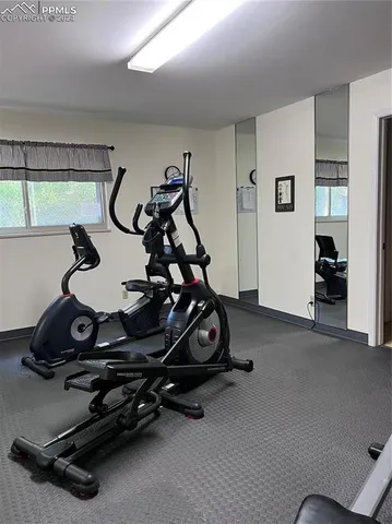 a room with furniture and window