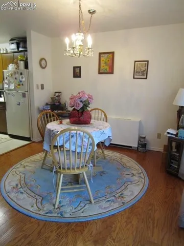 a view of a dining room with furniture