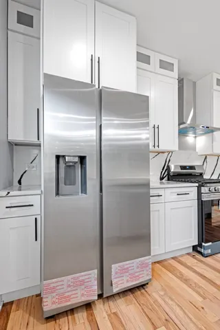 a kitchen with a stove and a sink