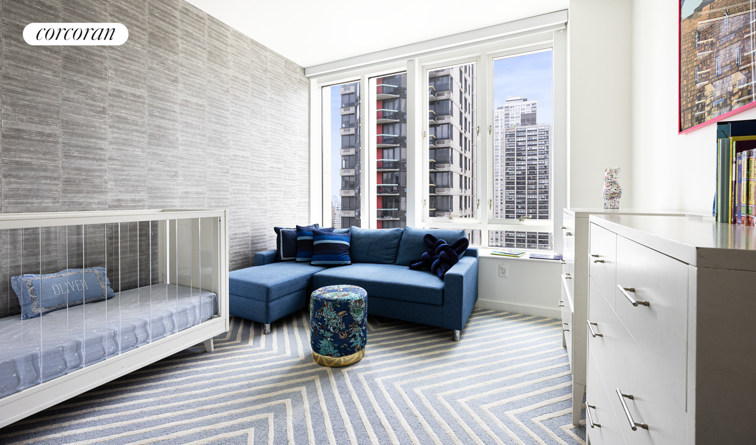 301 East 61st Street, Unit PH Manhattan, NY 10065 - Photo 10 of 16 a living room with furniture and a window