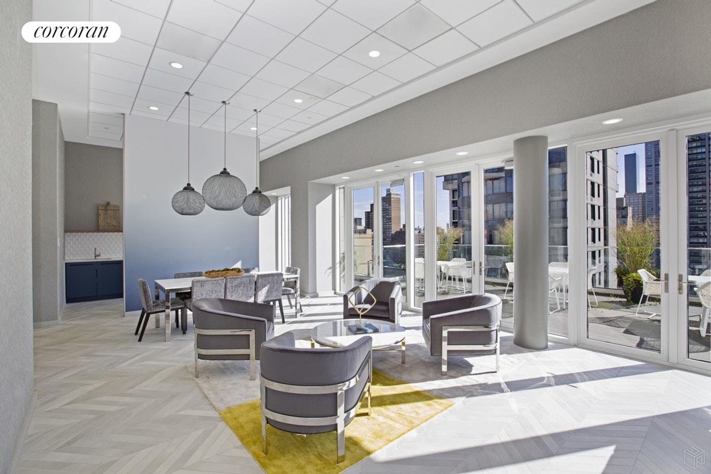 301 East 61st Street, Unit PH Manhattan, NY 10065 - Photo 12 of 16 a living room with fireplace furniture and a large window