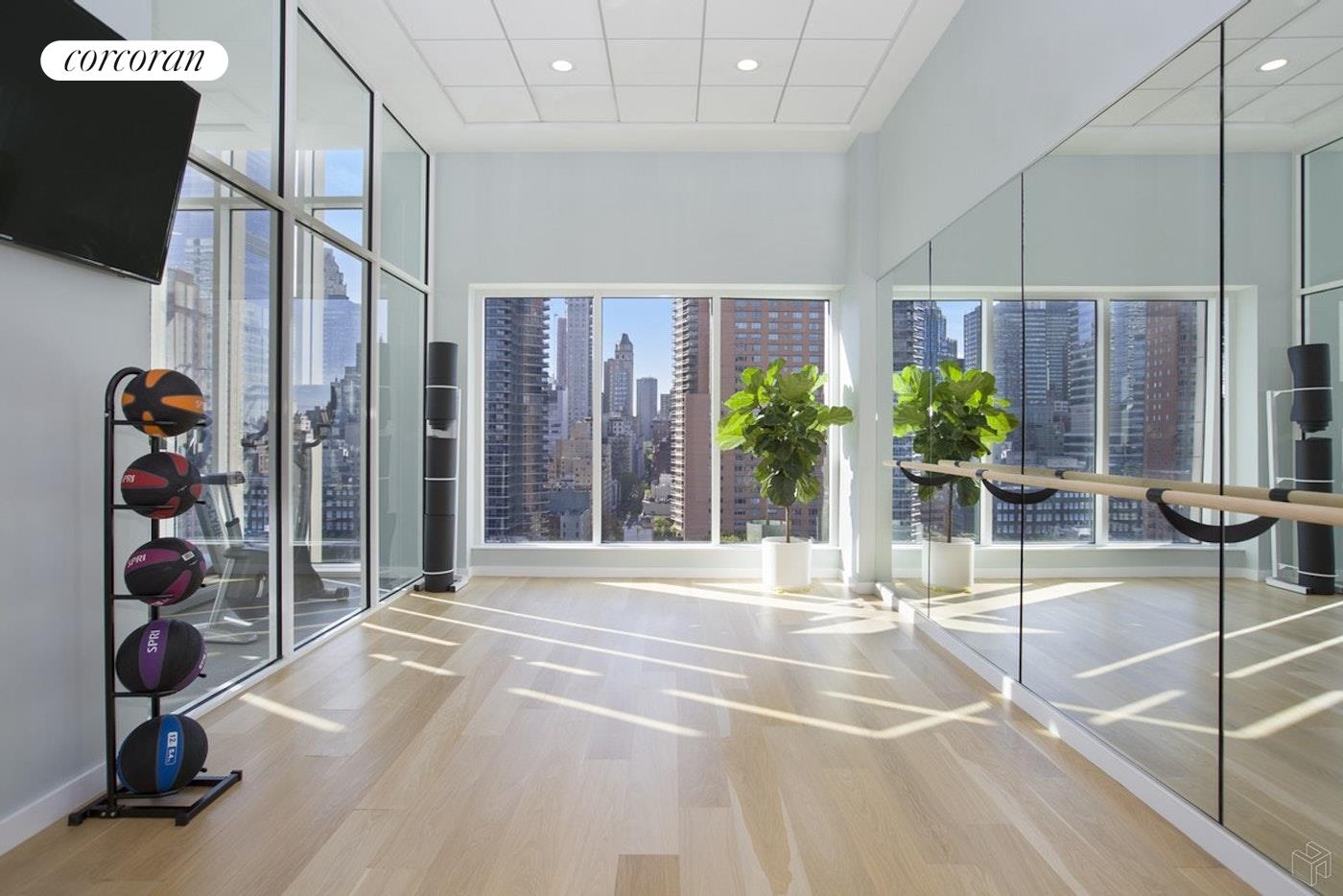 301 East 61st Street, Unit PH Manhattan, NY 10065 - Photo 14 of 16 a view of lobby with furniture and floor to ceiling window