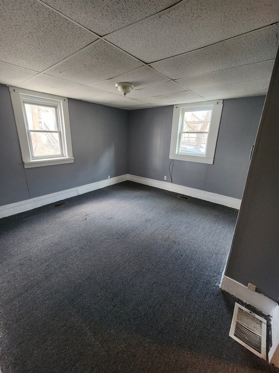 26 Hawley Street Worcester, MA 01609 - Photo 11 of 36 an empty room with windows