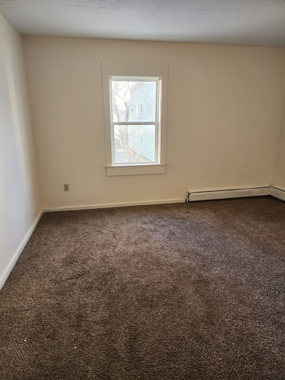 26 Hawley Street Worcester, MA 01609 - Photo 20 of 36 an empty room with a window