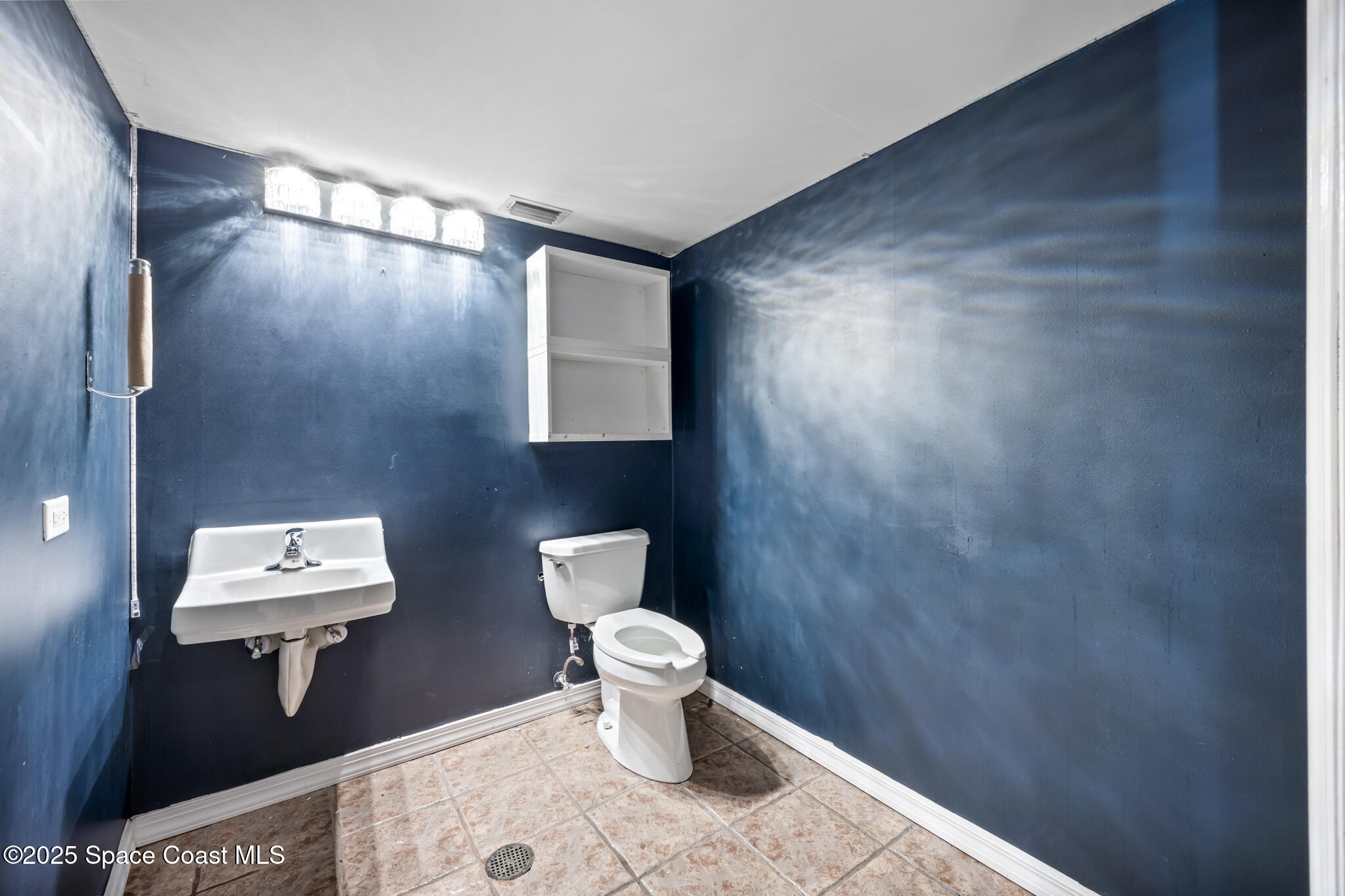 8255 North Wickham Road, Unit 101 Melbourne, FL 32940 - Photo 15 of 31 Restroom 1