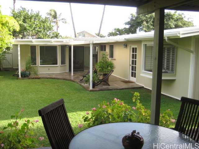 215 Alala Road Kailua, HI 96734 - Photo 1 of 1 a view of a house with backyard sitting area and garden
