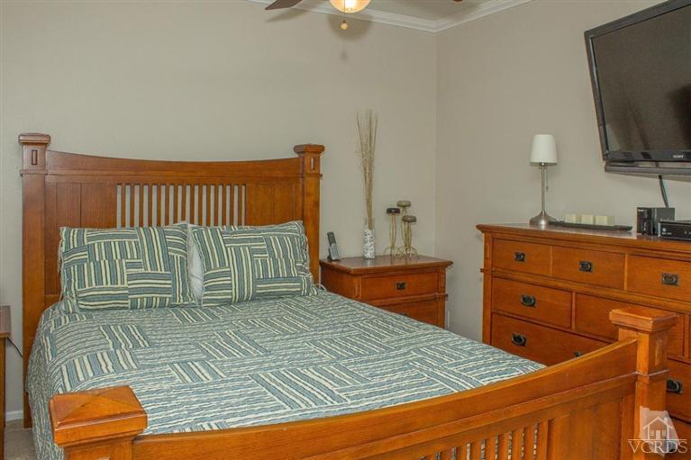 6360 Keystone Street Simi Valley, CA 93063 - Photo 12 of 17 a bedroom with a bed and a television