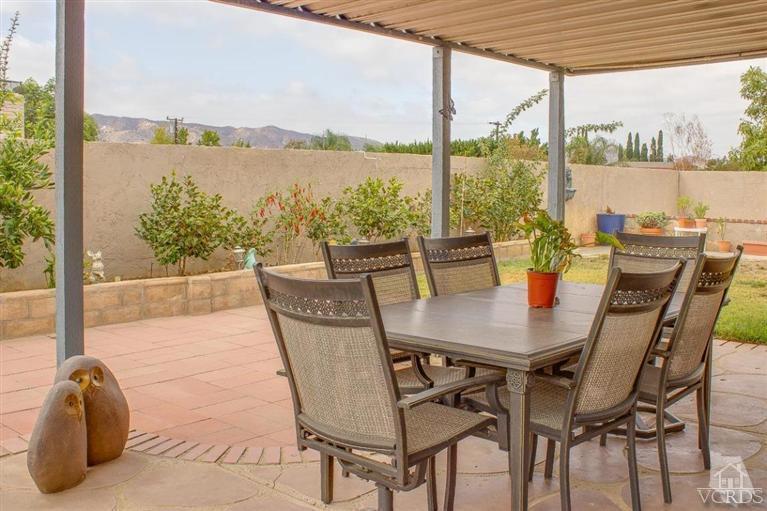 6360 Keystone Street Simi Valley, CA 93063 - Photo 15 of 17 a dining room with furniture and a lake view