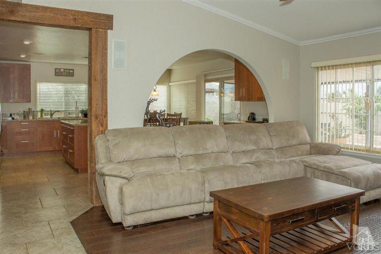 6360 Keystone Street Simi Valley, CA 93063 - Photo 6 of 17 a view of living room with granite countertop furniture and fireplace