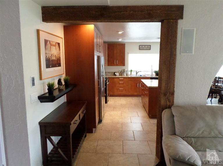 6360 Keystone Street Simi Valley, CA 93063 - Photo 7 of 17 a kitchen with a table and chairs in it