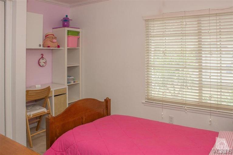 6360 Keystone Street Simi Valley, CA 93063 - Photo 10 of 17 a bedroom with a bed and a window